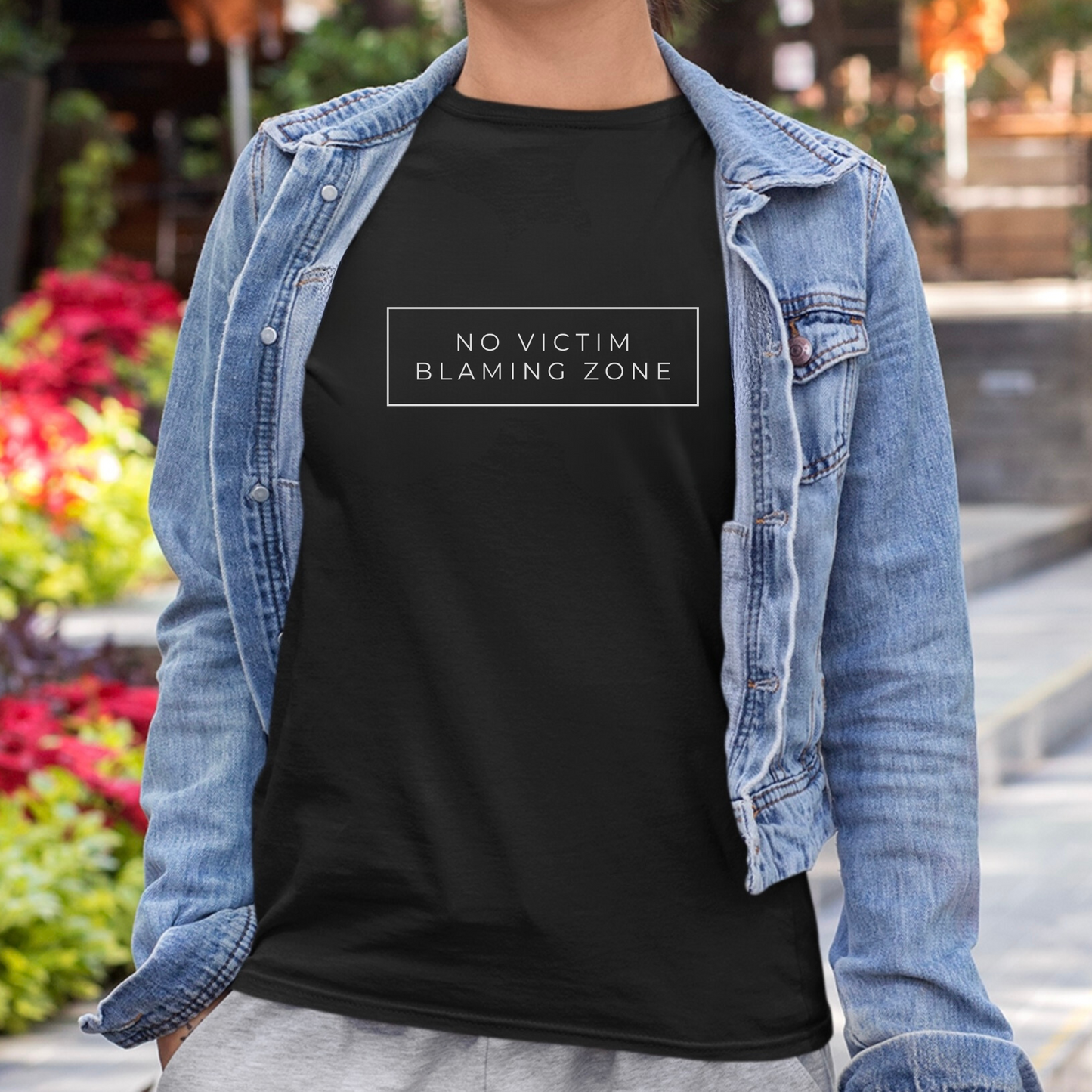 Soft Bella + Canvas Solid Black Blend No Victim Blaming Zone shirt for activism, advocacy, and survivor support.