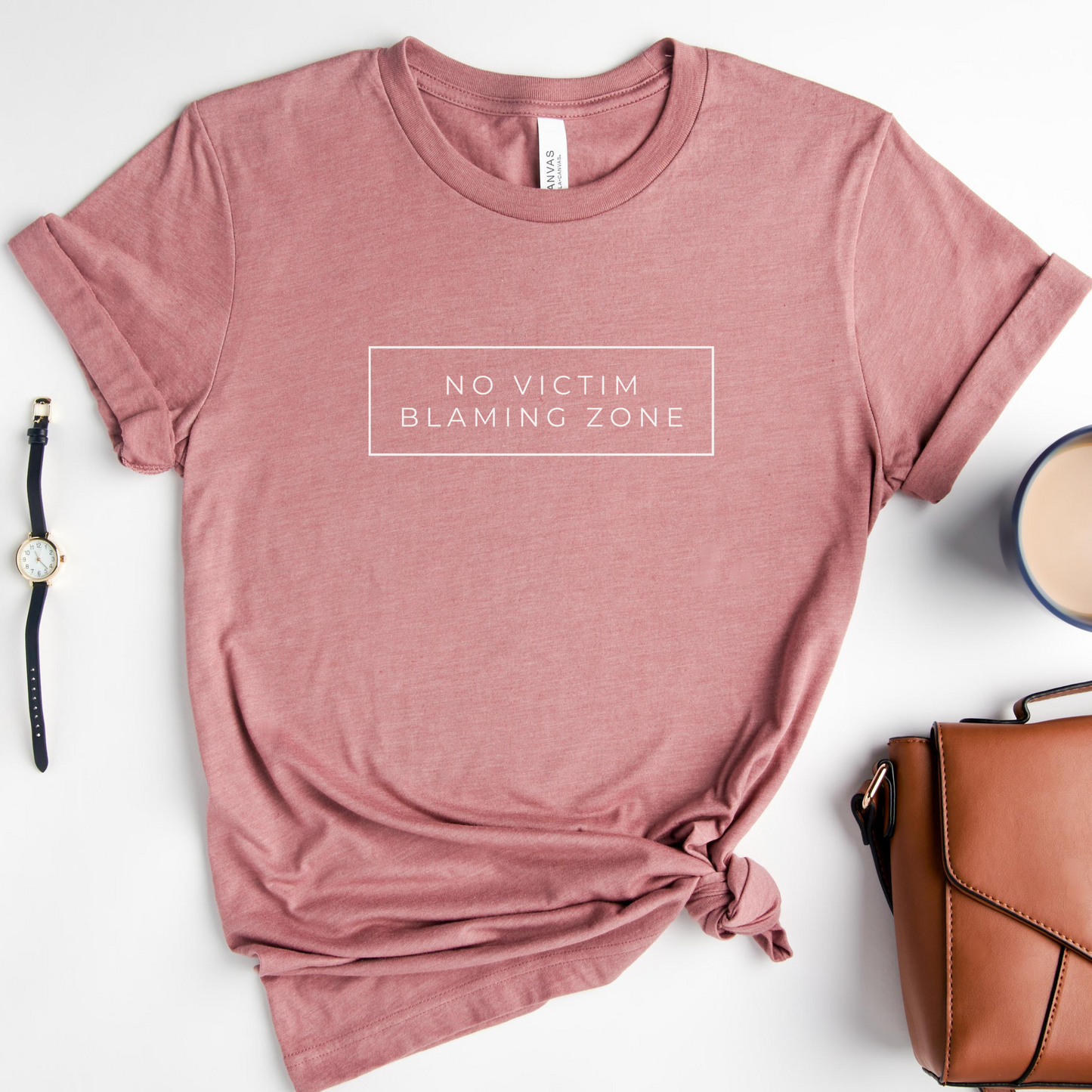 Bella + Canvas Heather Mauve No Victim Blaming Zone shirt for survivors, allies, and advocates. Empowerment activism tee.