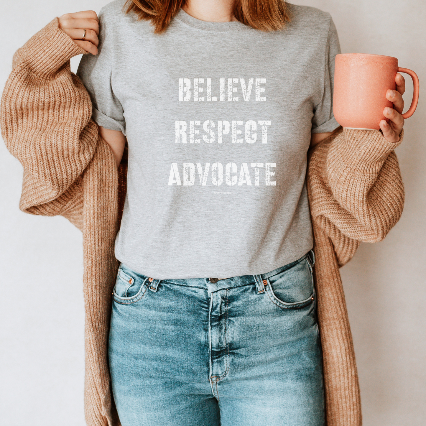 The front of this tshirt has the empowering words Believe Respect Advocate in a bold distressed font. Created for survivors of trauma and abuse, as well as mental health advocates who believe in fostering respect and supporting survivors