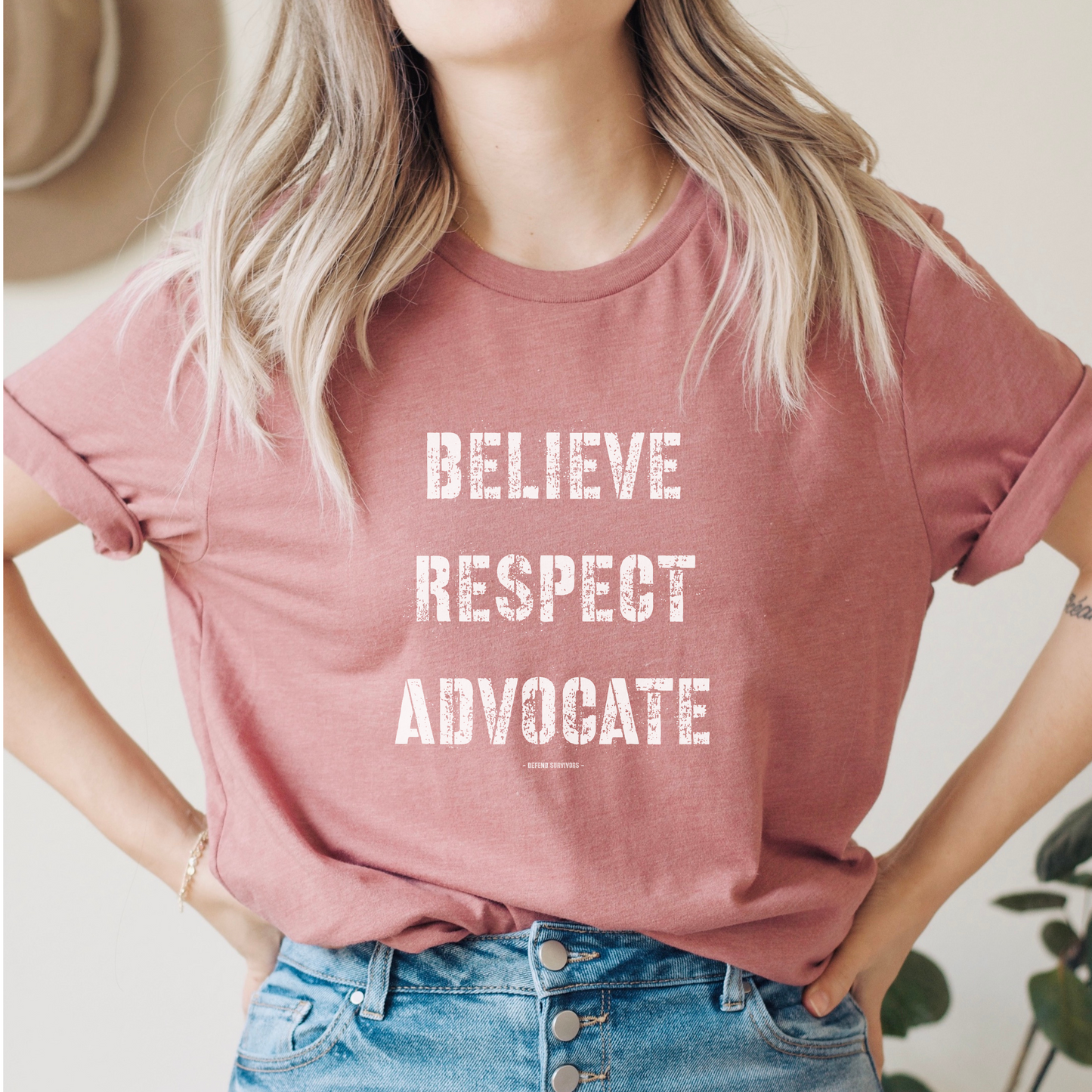 The front of this tshirt has the empowering words Believe Respect Advocate in a bold distressed font. Created for survivors of trauma and abuse, as well as mental health advocates who believe in fostering respect and supporting survivors