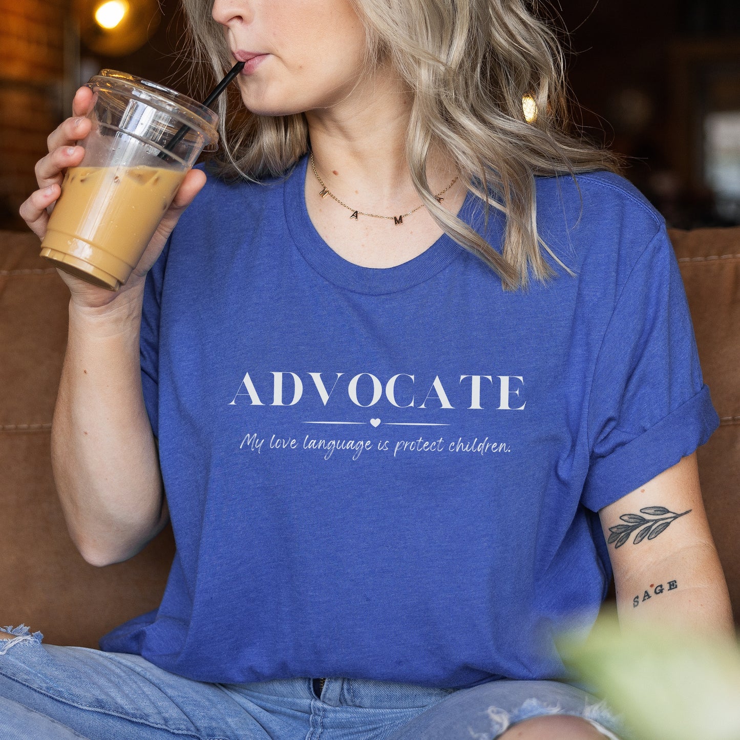 Front and center, the bold message declares, "ADVOCATE: my love language is protect children." This impactful phrase encapsulates the essence of your commitment to safeguarding children and promoting their well-being. Perfect for child advocates, champions of children’s mental health, and for Child Abuse Awareness and Prevention Month