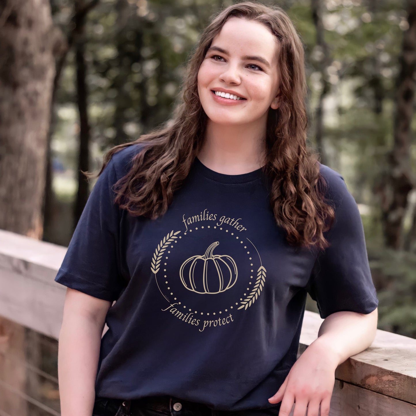 Adorned with a heartwarming autumn-fall harvest pumpkin graphic and the inspiring message Families Gather, Families Protect, this White T-shirt stands as a testament to the unwavering support and protection families should offer to survivors.