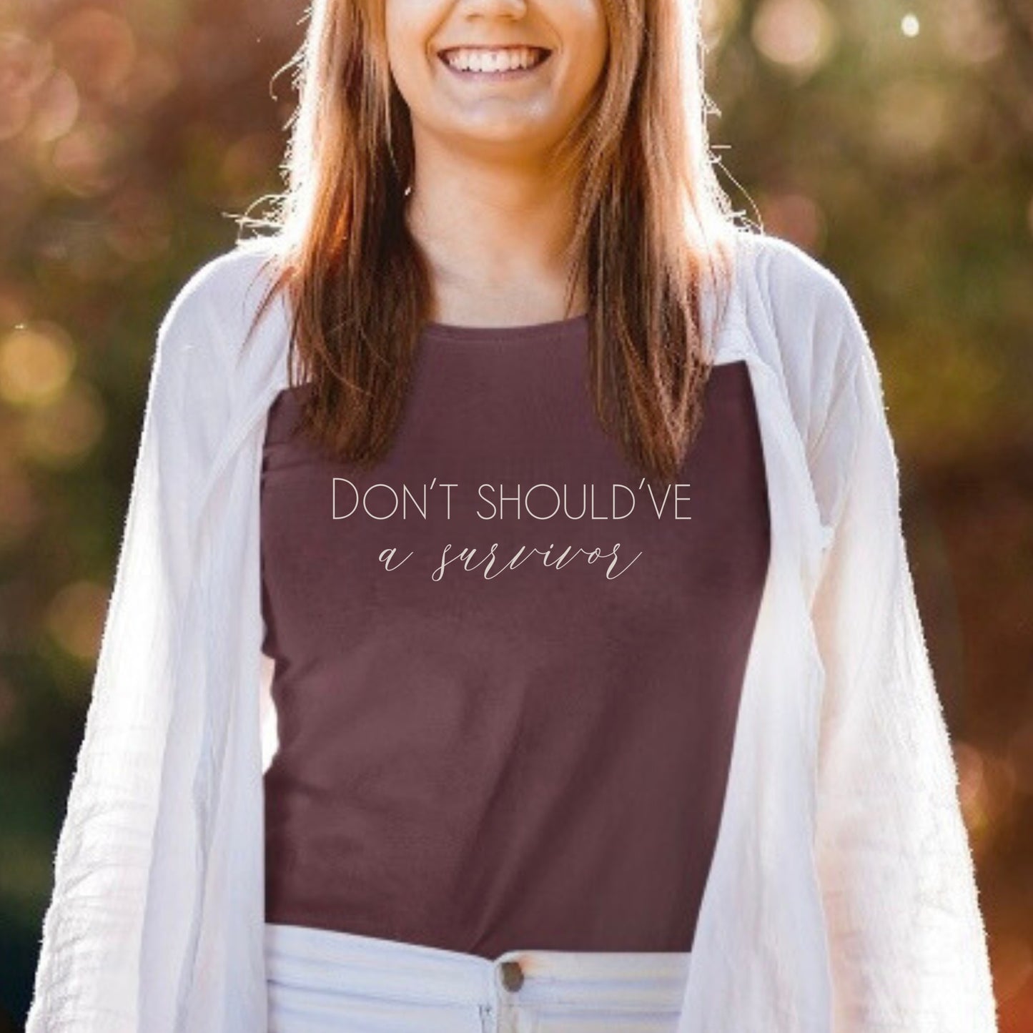 The bold and impactful slogan, "Don't Should've A Survivor," sends a clear message against the harmful practice of victim blaming. By wearing this shirt, you become an advocate for change, contributing to a culture of empathy, understanding, and respect. Perfect for survivors of abuse and trauma, victim advocates, and mental health advocates.