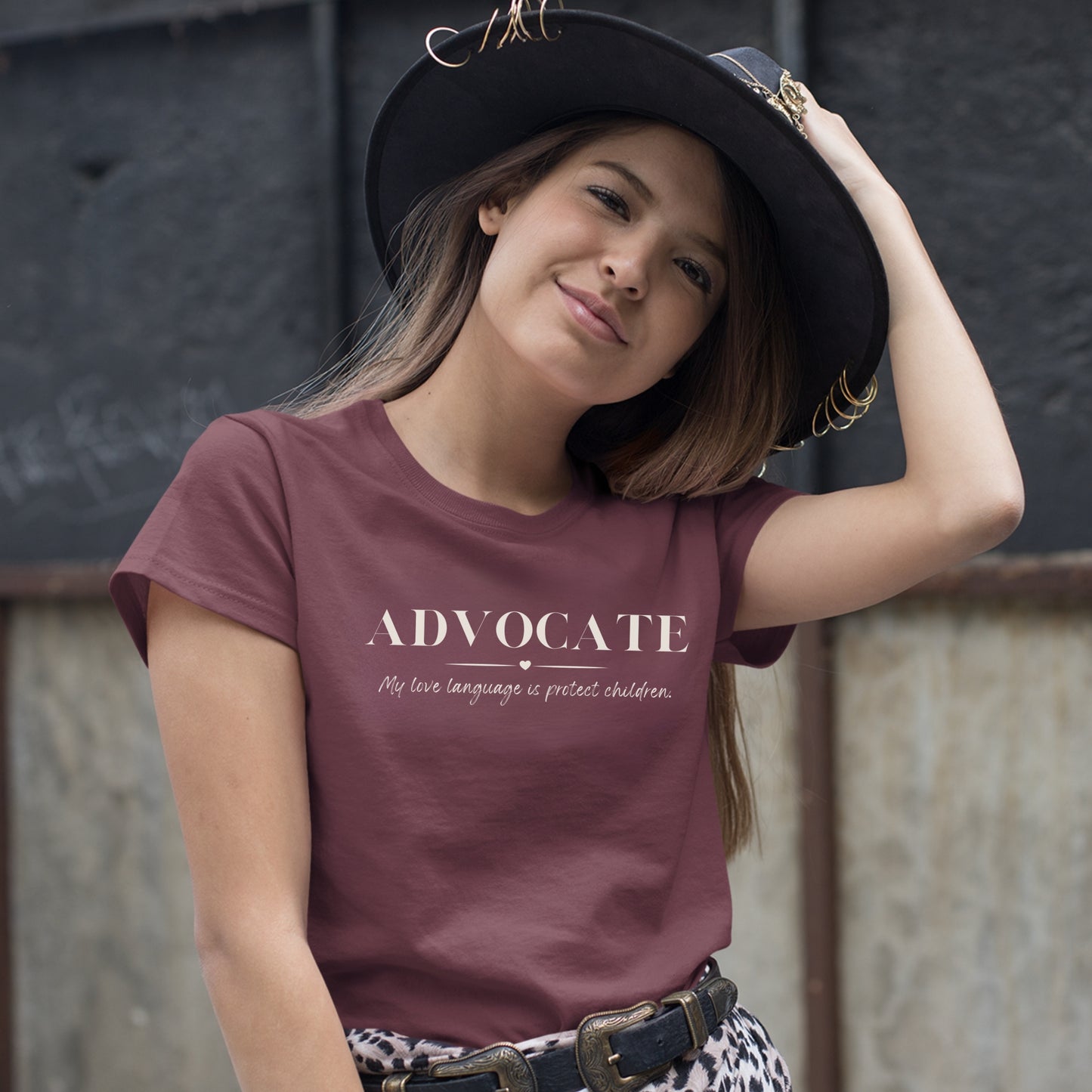 Front and center, the bold message declares, "ADVOCATE: my love language is protect children." This impactful phrase encapsulates the essence of your commitment to safeguarding children and promoting their well-being. Perfect for child advocates, champions of children’s mental health, and for Child Abuse Awareness and Prevention Month