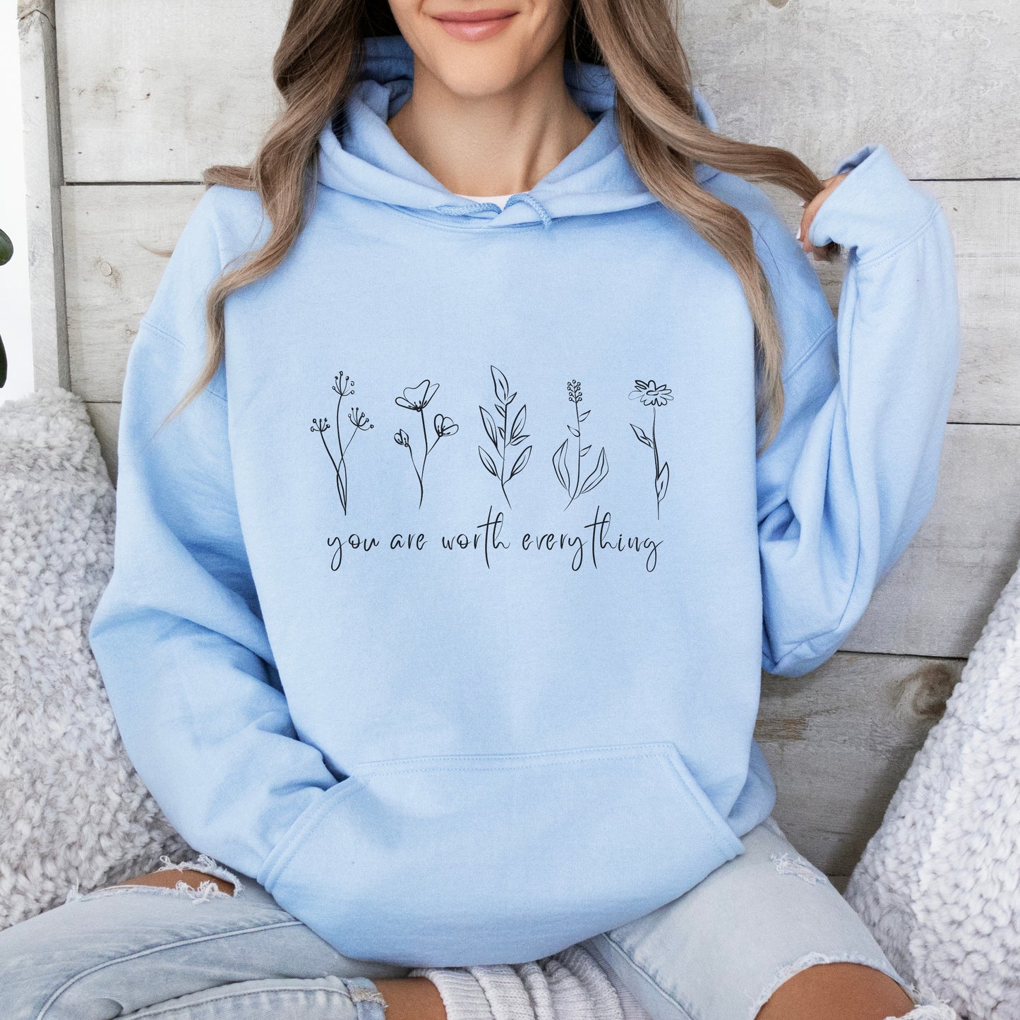 Adorned with beautiful wildflowers graphic and the empowering affirmation message You Are Worth Everything, this Tshirt is a wearable reminder of your inherent value worth and uniqueness.