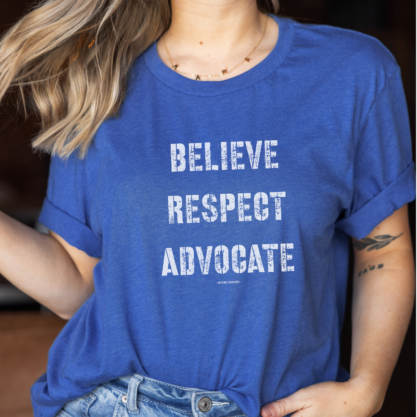 The front of this tshirt has the empowering words Believe Respect Advocate in a bold distressed font. Created for survivors of trauma and abuse, as well as mental health advocates who believe in fostering respect and supporting survivors