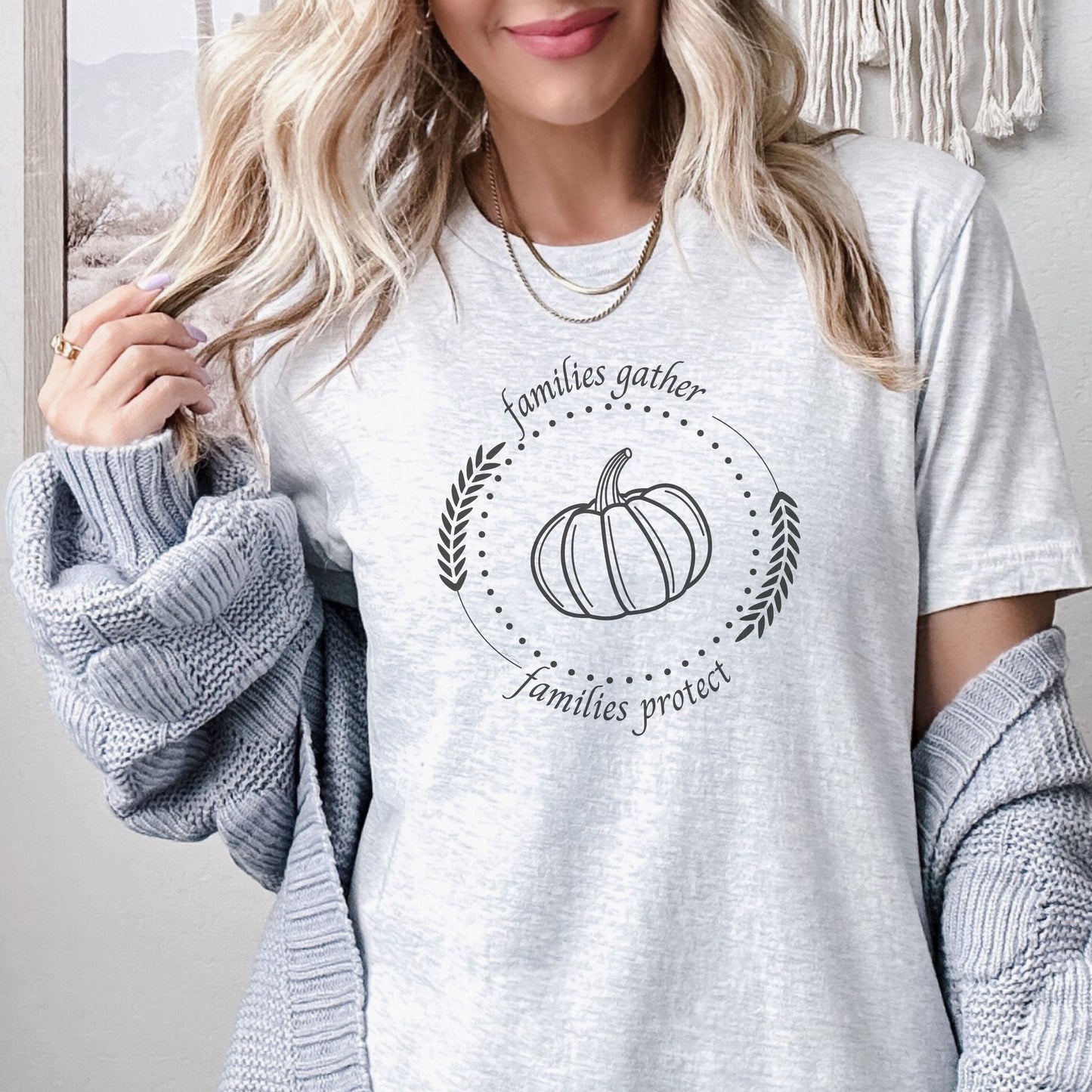 Adorned with a heartwarming autumn-fall harvest pumpkin graphic and the inspiring message Families Gather, Families Protect, this White T-shirt stands as a testament to the unwavering support and protection families should offer to survivors.