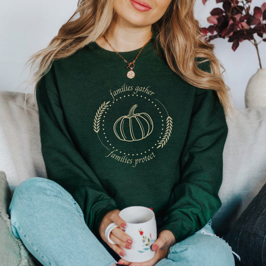 Adorned with a heartwarming autumn fall harvest pumpkin graphic and the inspiring message Families Gather, Families Protect, this crewneck sweatshirt stands as a testament to the unwavering support and protection families should offer to survivors.