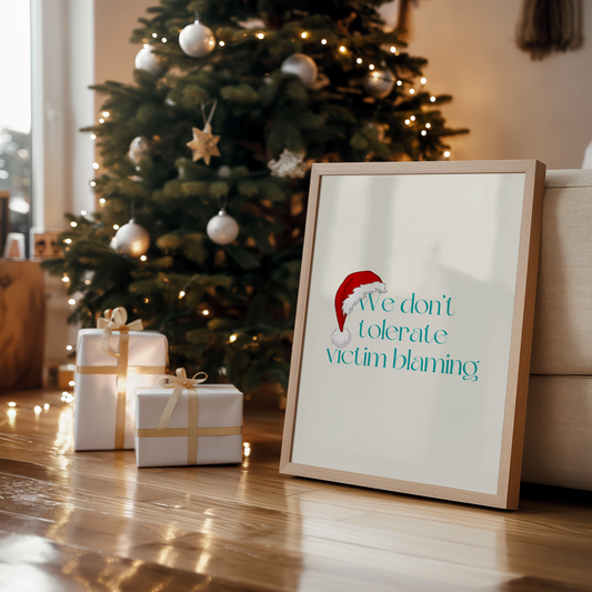 This Santa Hat We Dont Tolerate Victim Blaming  holiday wall art digital download is designed to add festive cheer with a powerful message. Perfect for survivors, advocates, and mental health supporters this printable holiday decor encourages empathy