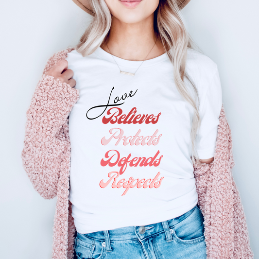 The front of this tshirt has the impactful phrase, "Love Believes Protects Defends Respects," artfully displayed in a beautiful retro font, capturing attention while spreading a message of compassion, strength, and support. Crafted with care and commitment, this tee combines a powerful message with a touch of retro elegance.