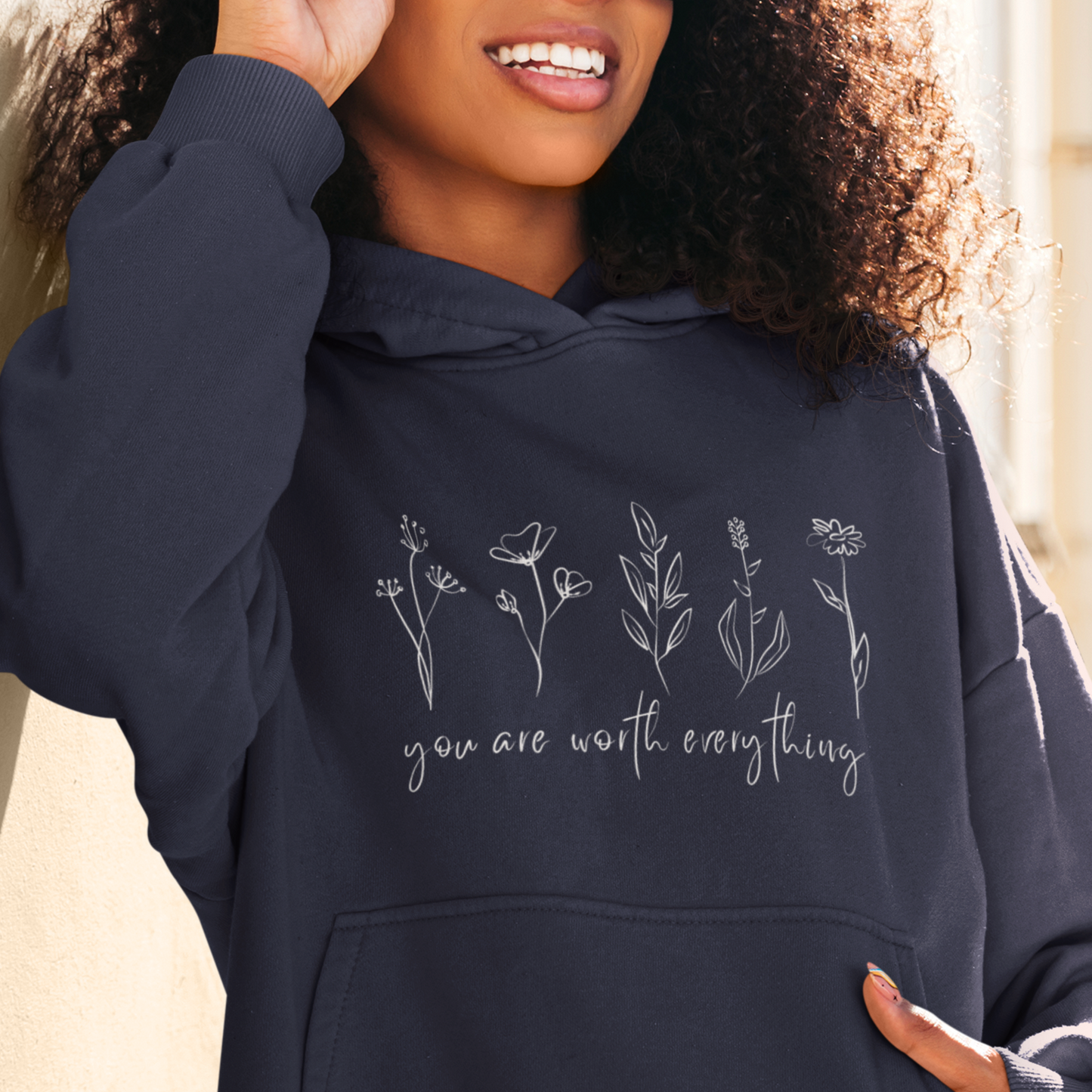 Adorned with beautiful wildflowers graphic and the empowering affirmation message You Are Worth Everything, this Tshirt is a wearable reminder of your inherent value worth and uniqueness.