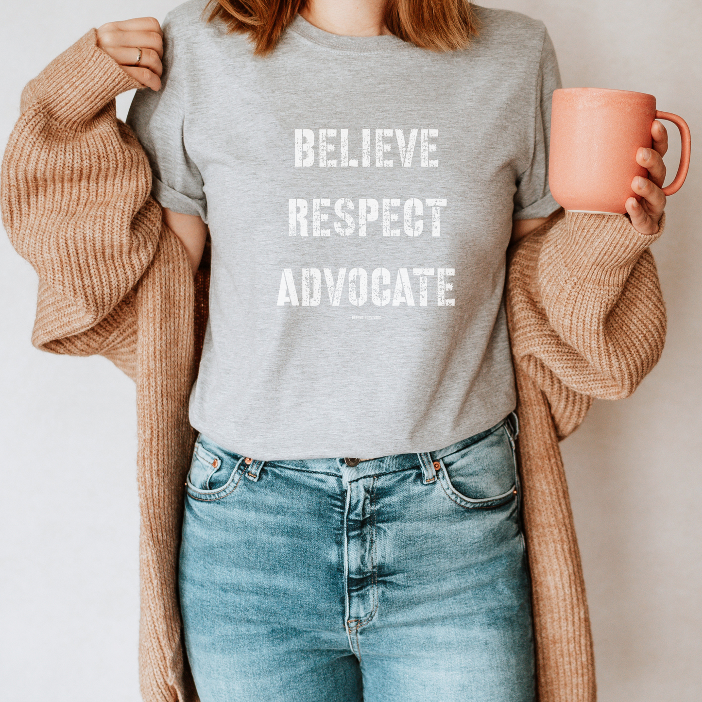  The front of this tshirt has the empowering words Believe Respect Advocate in a bold distressed font. Created for survivors of trauma and abuse, as well as mental health advocates who believe in fostering respect and supporting survivors