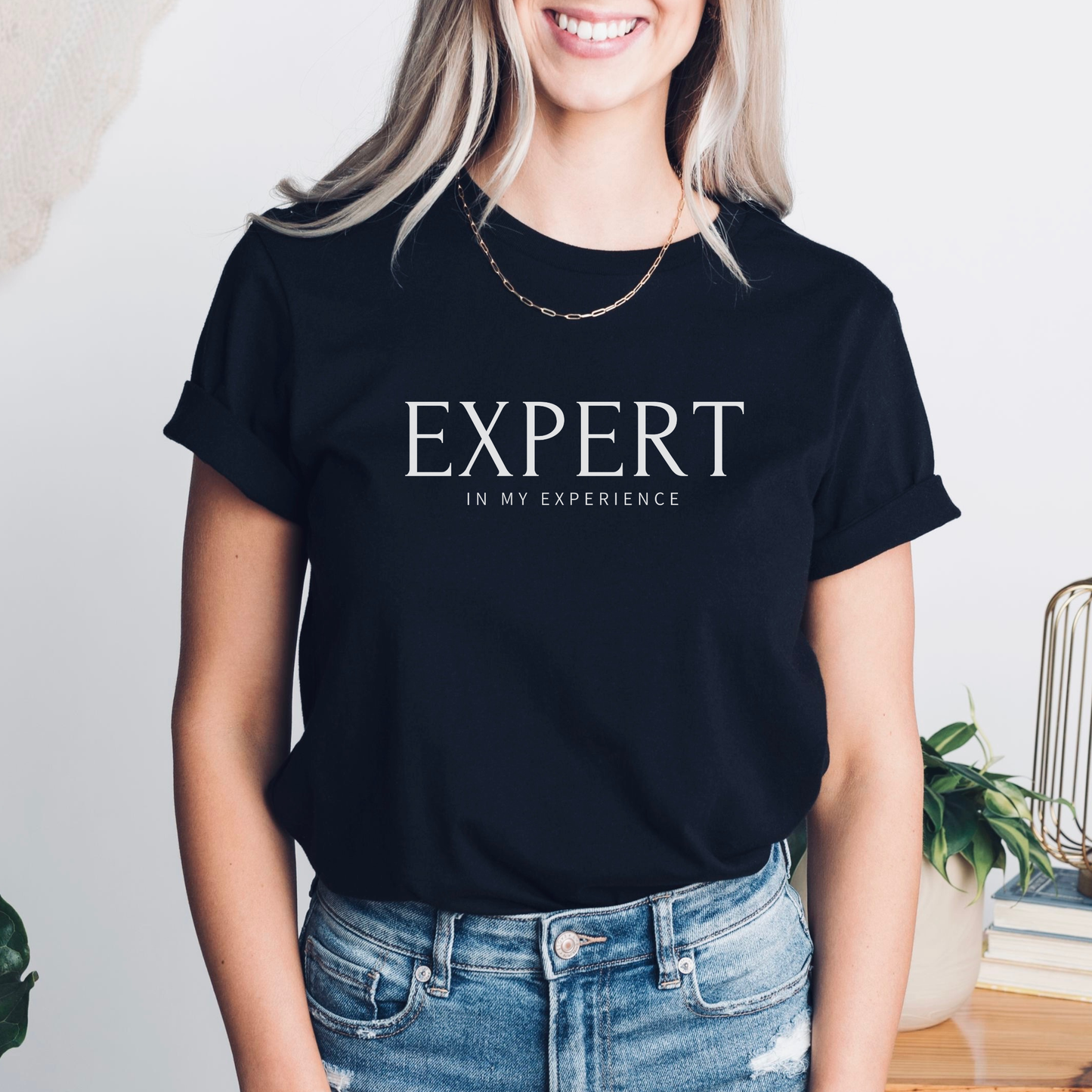 Expert in My Experience t-shirt in solid black blend with white text. Unisex Bella + Canvas empowerment tee for survivors and advocates.