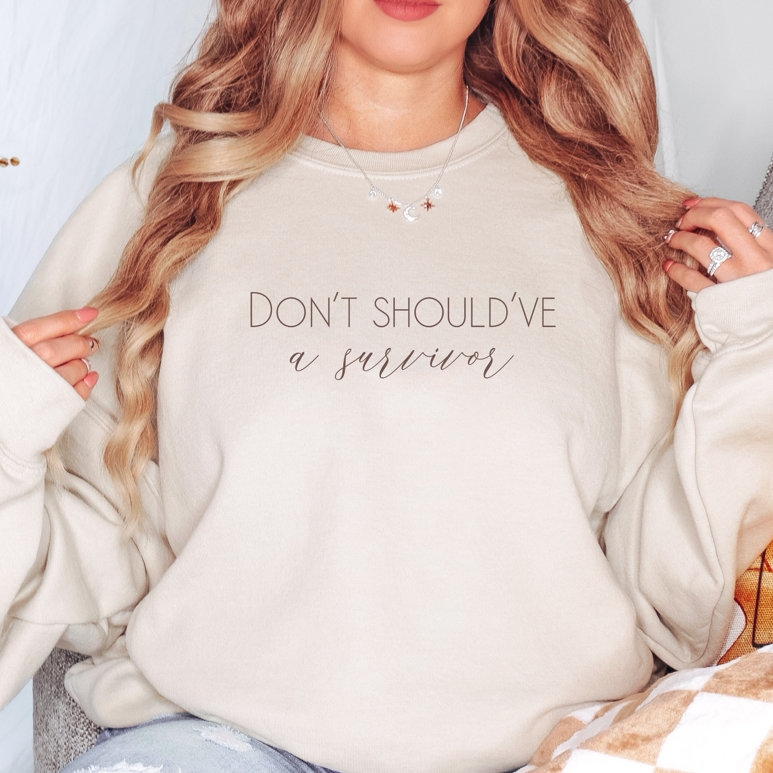 The bold and impactful slogan, "Don't Should've A Survivor," sends a clear message against the harmful practice of victim blaming. By wearing this shirt, you become an advocate for change, contributing to a culture of empathy, understanding, and respect. Perfect for survivors of abuse and trauma, victim advocates, and mental health advocates.