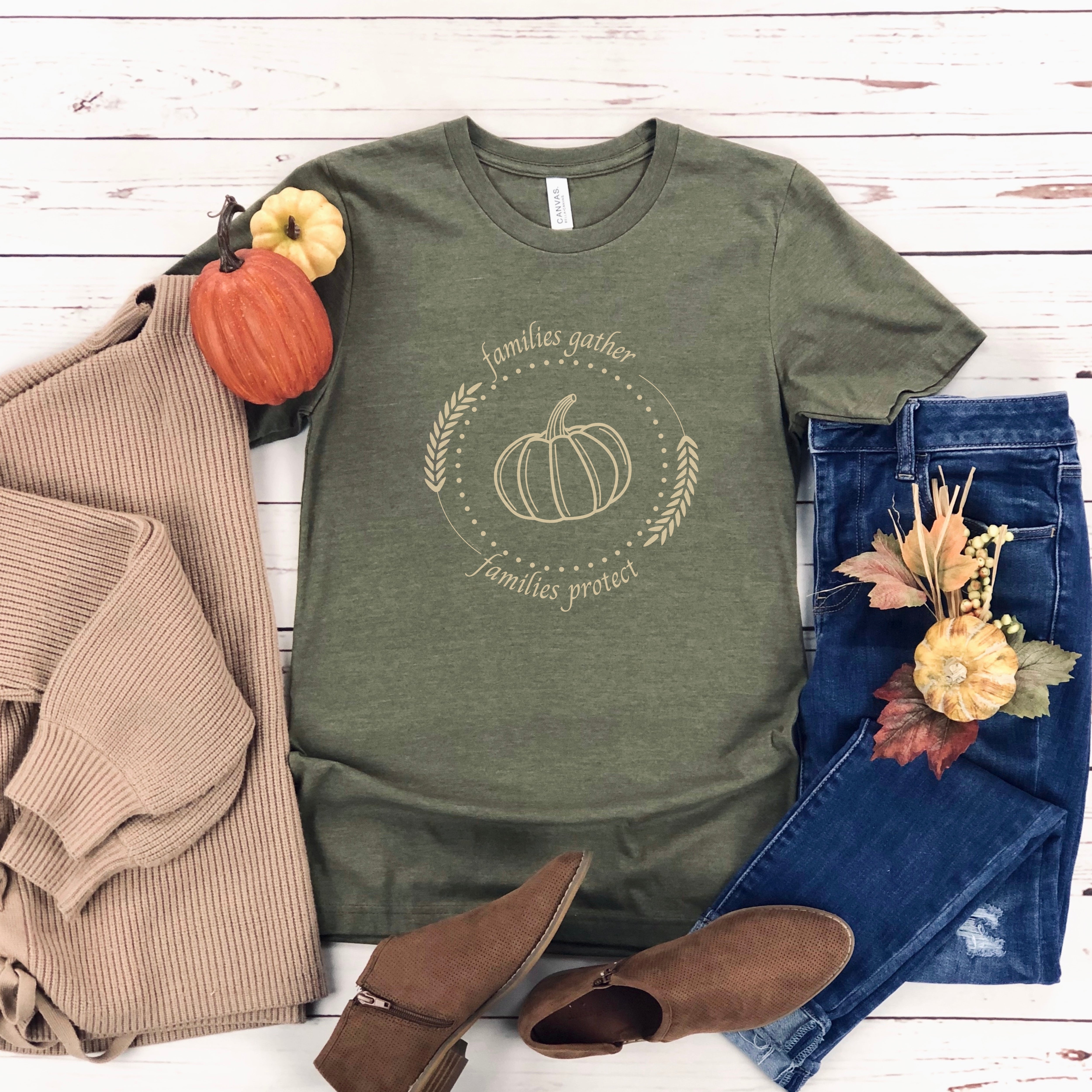 Adorned with a heartwarming autumn-fall harvest pumpkin graphic and the inspiring message Families Gather, Families Protect, this T-shirt stands as a testament to the unwavering support and protection families should offer to survivors.