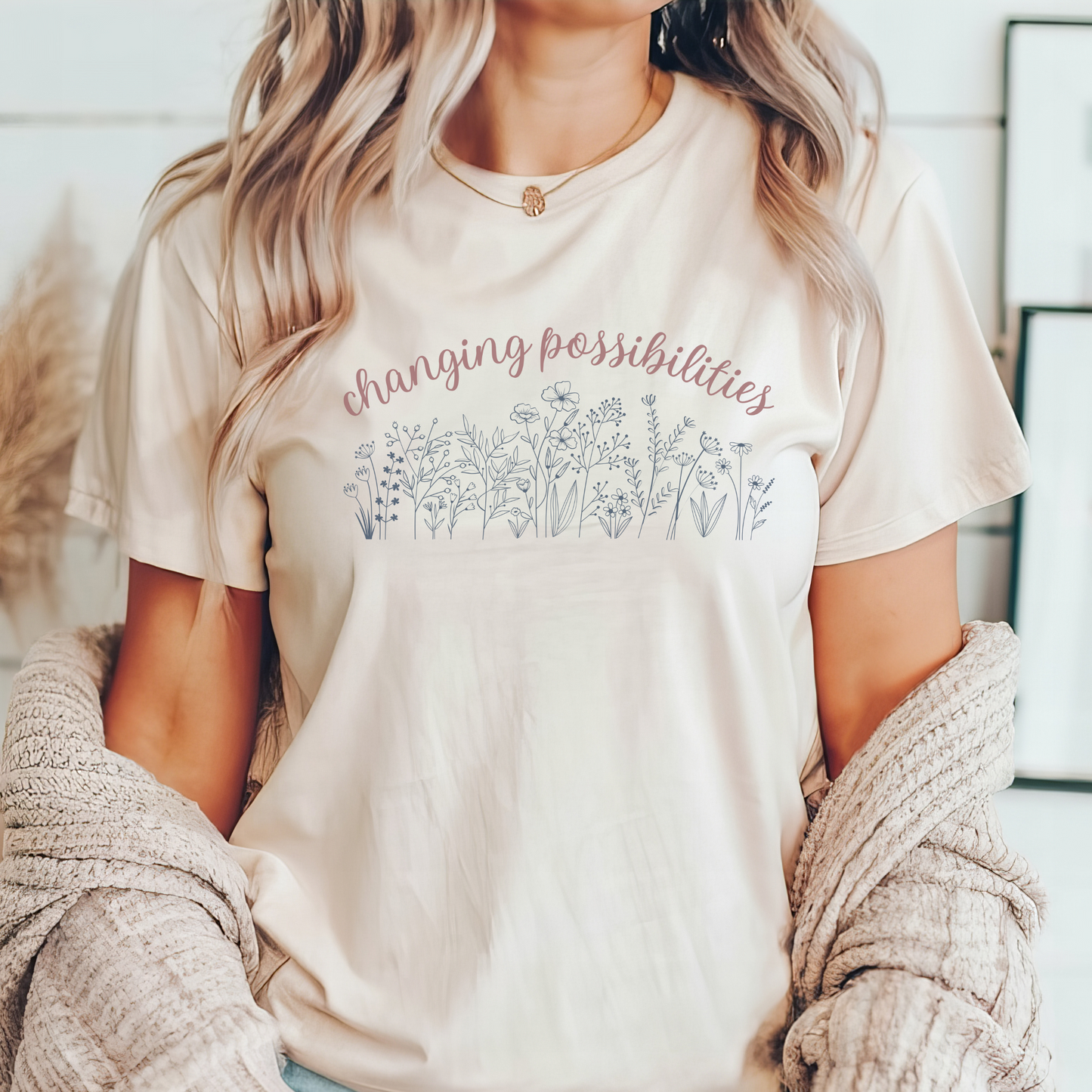 The front of this tshirt has the empowering words Changing Possibilities over a beautiful wildflower design. This tee celebrates advocates who are changing the world. Join the movement to change possibilities and create a culture of empowerment.