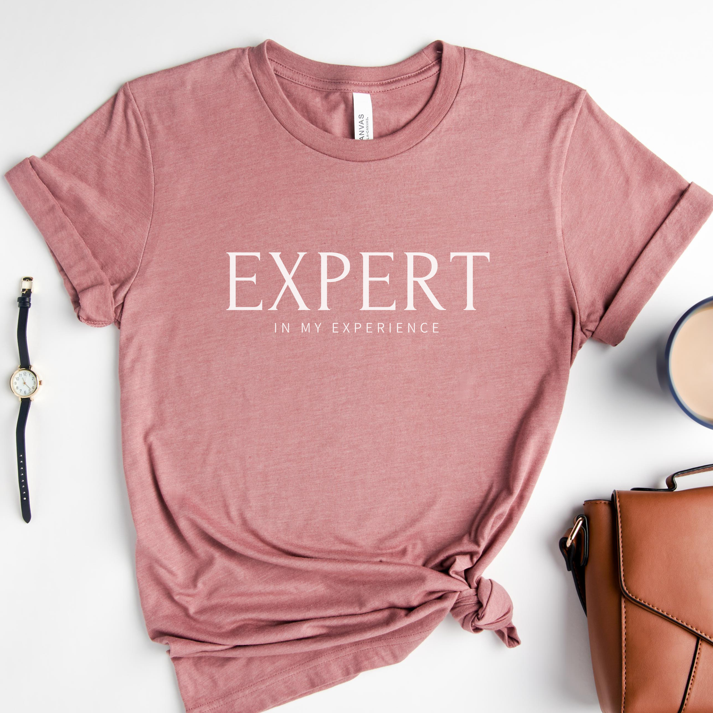 Expert in My Experience t-shirt in heather mauve with white lettering. Gentle muted rose empowerment shirt for survivors and advocates.