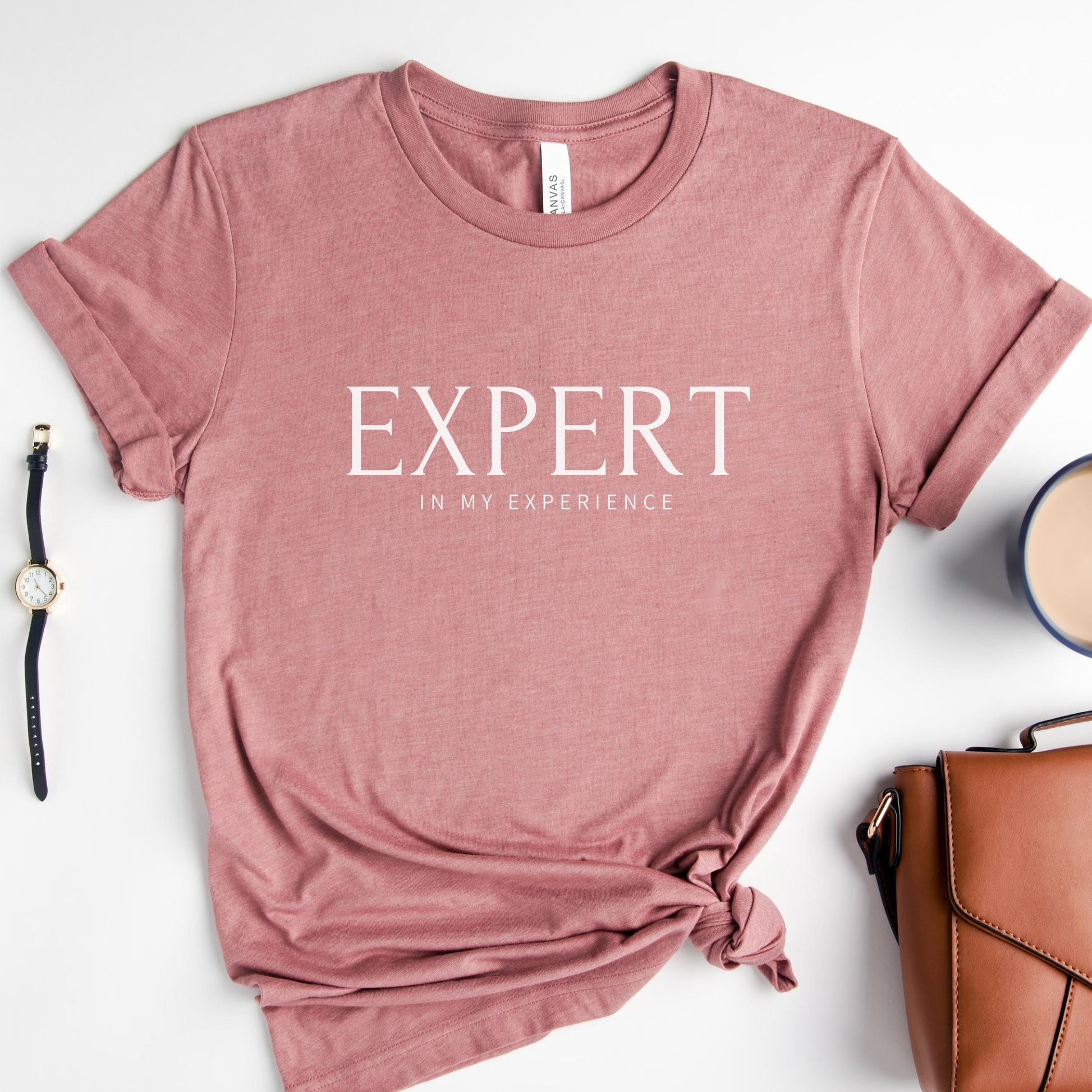 Expert in My Experience t-shirt in heather mauve with white lettering. Gentle muted rose empowerment shirt for survivors and advocates.