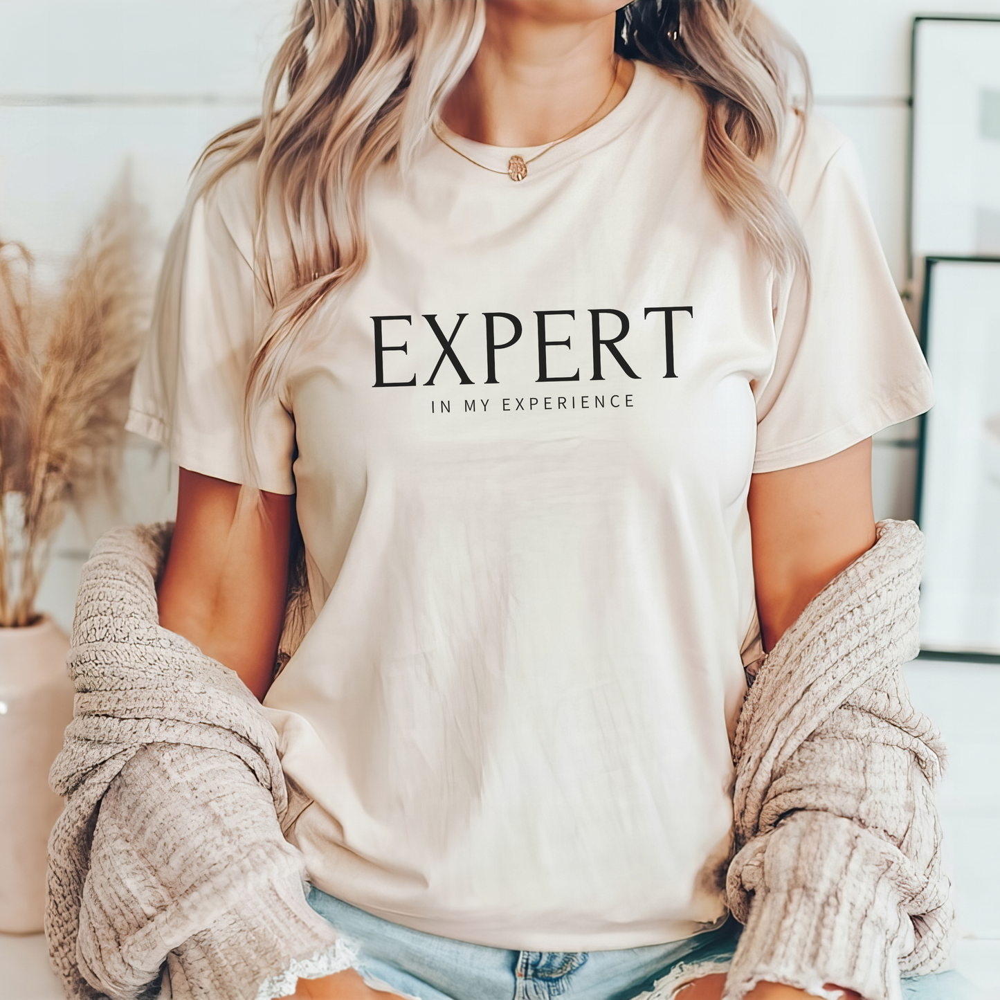 Expert in My Experience t-shirt in natural off-white with black text. Soft neutral empowerment tee for survivors and advocates.