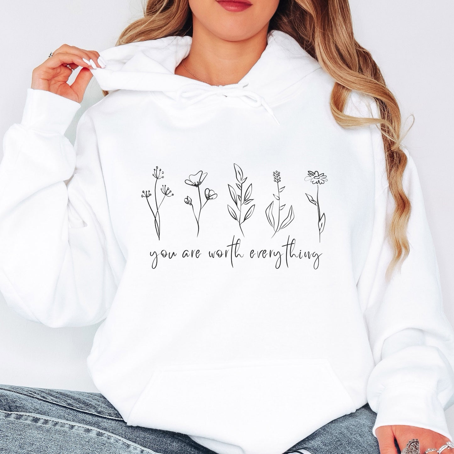 Adorned with beautiful wildflowers graphic and the empowering affirmation message You Are Worth Everything, this Tshirt is a wearable reminder of your inherent value worth and uniqueness.